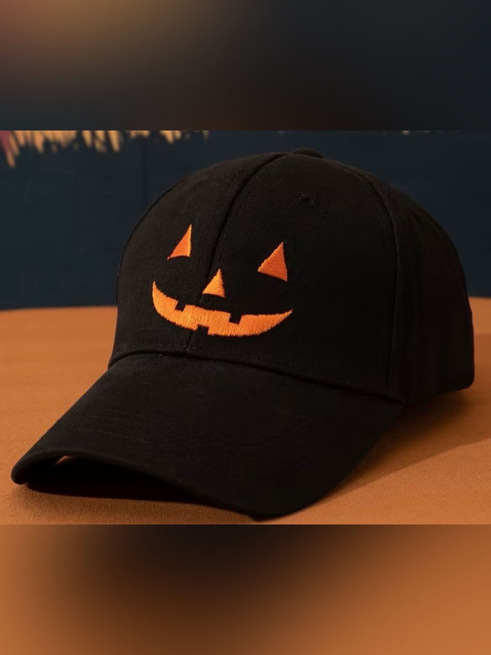 Black Baseball Cap with Orange Pumpkin Face Embroidery